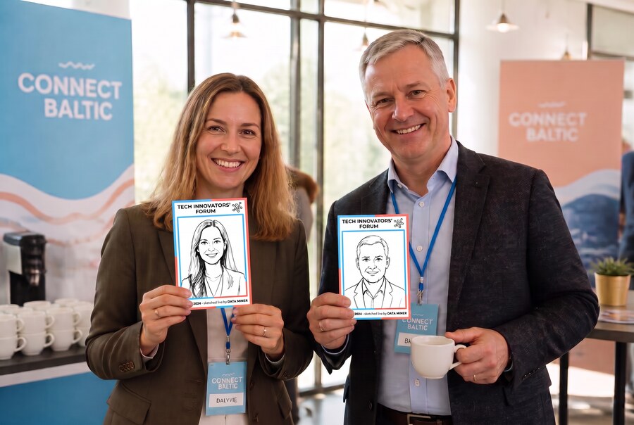 Two colleagues holding their classic robot-drawn portrait sketches at a conference
